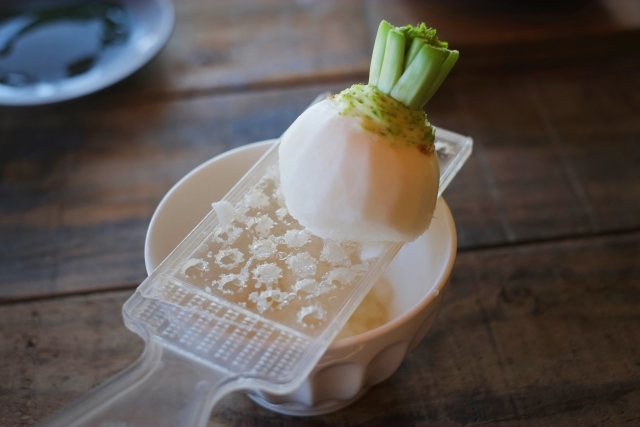 A picture shows Japanese grater, Oroshigane, and grated Japanese radish,  daikon-oroshi, in Tokyo on May