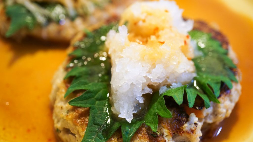 A picture shows Japanese grater, Oroshigane, and grated Japanese radish,  daikon-oroshi, in Tokyo on May